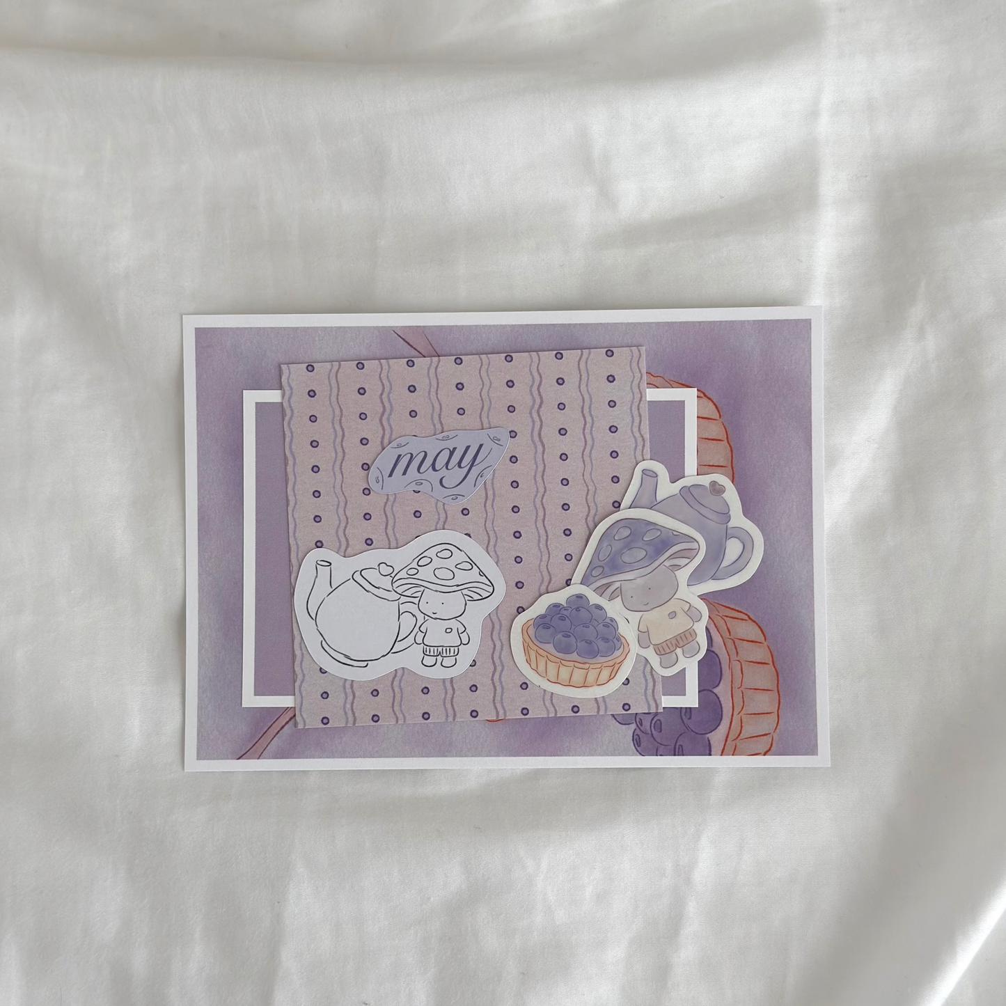 inside may's snail mail. includes three stickers with a teapot, fruit tart, and a mushroom character. includes a 5x7 art print and a 4x4 art print